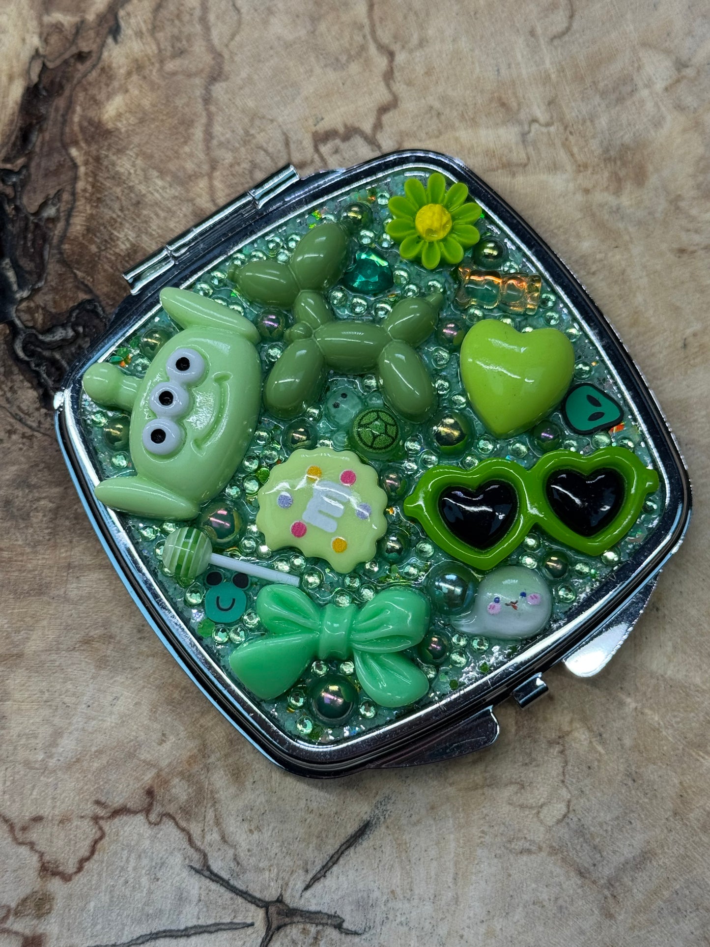 Green Glitz pre-made metal compact