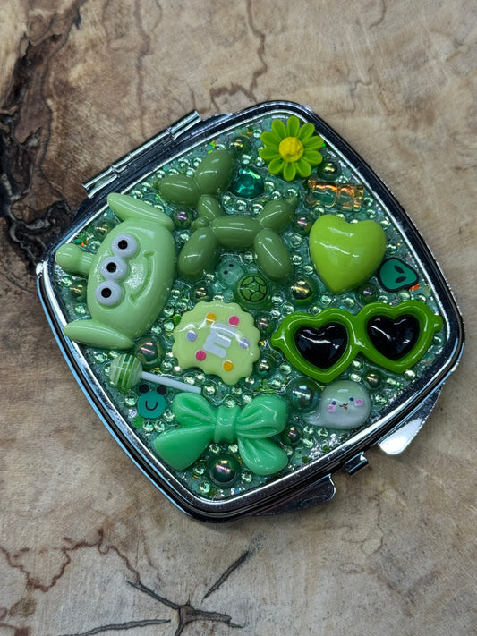 Green Glitz pre-made metal compact